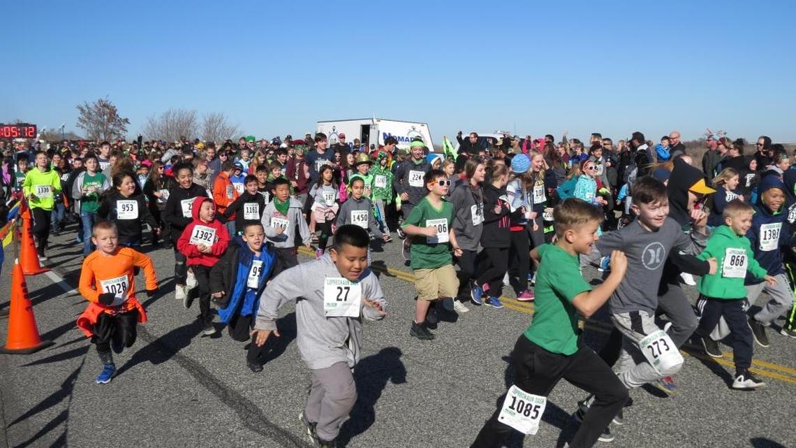 Hundreds of kids participated Saturday in the annual Leprechaun Dash, the annual one-mile race that accompanies the St. Parick Day Foot Race along Columbia Park Trail. The dash is expected to raise several thousand dollars, which will be shared among elementary schools with at least 100 students finishing the race.