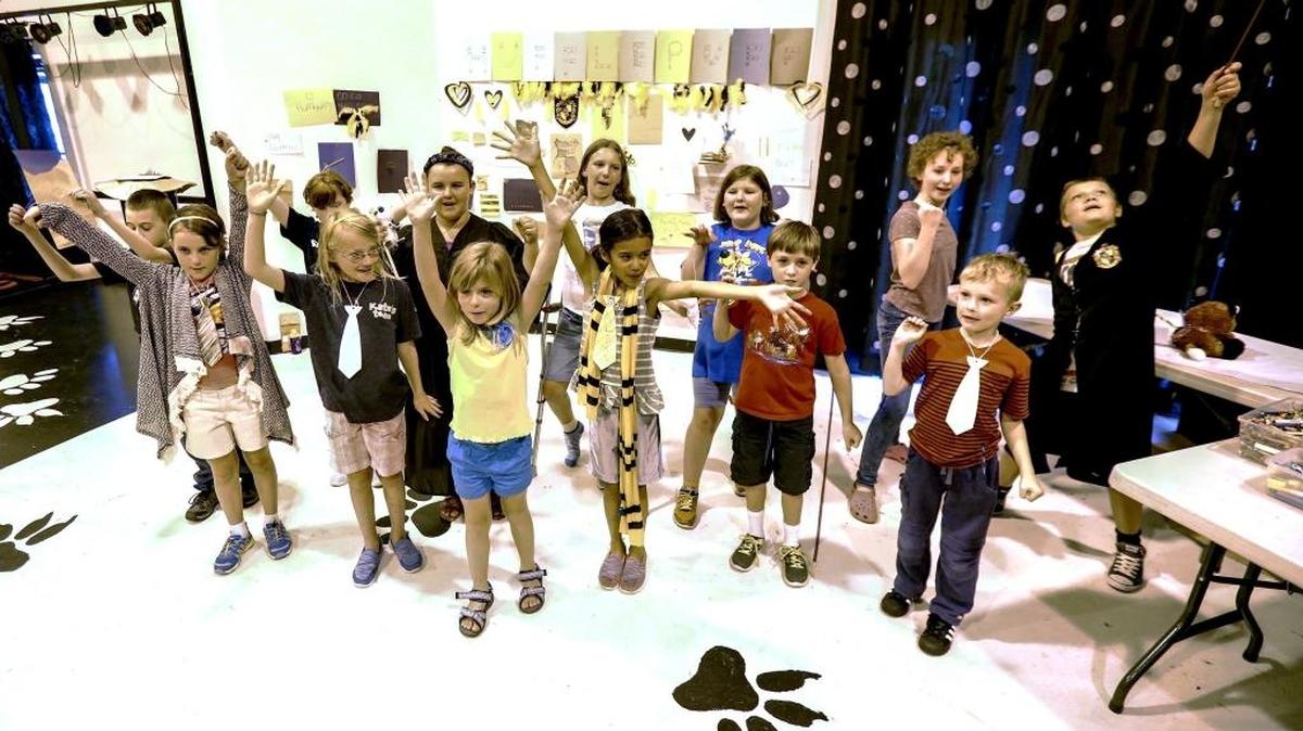 Team Hufflepuff performs its house chant, which the kids came up with together, at the Academy of Children’s Theater in Richland on Tuesday. Students from grades 2-6 are sorted into houses from the Harry Potter series and participate in a weeklong class themed on the popular books. For more information, go to academyofchildrenstheatre.org