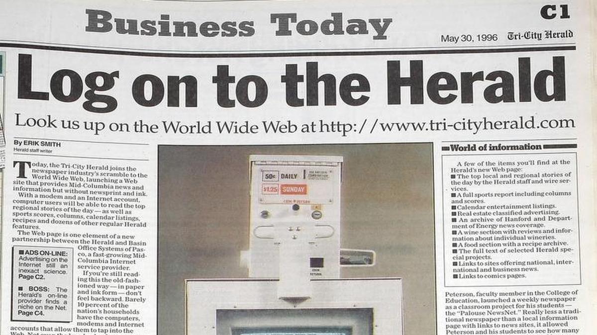 The business section cover of the Tri-City Herald, from May 30, 1996, announces the launch of the company's website.