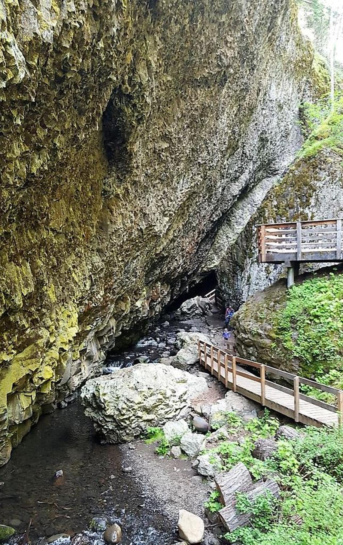 Platforms offer views of the ravine at the exit to the main Boulder Cave.