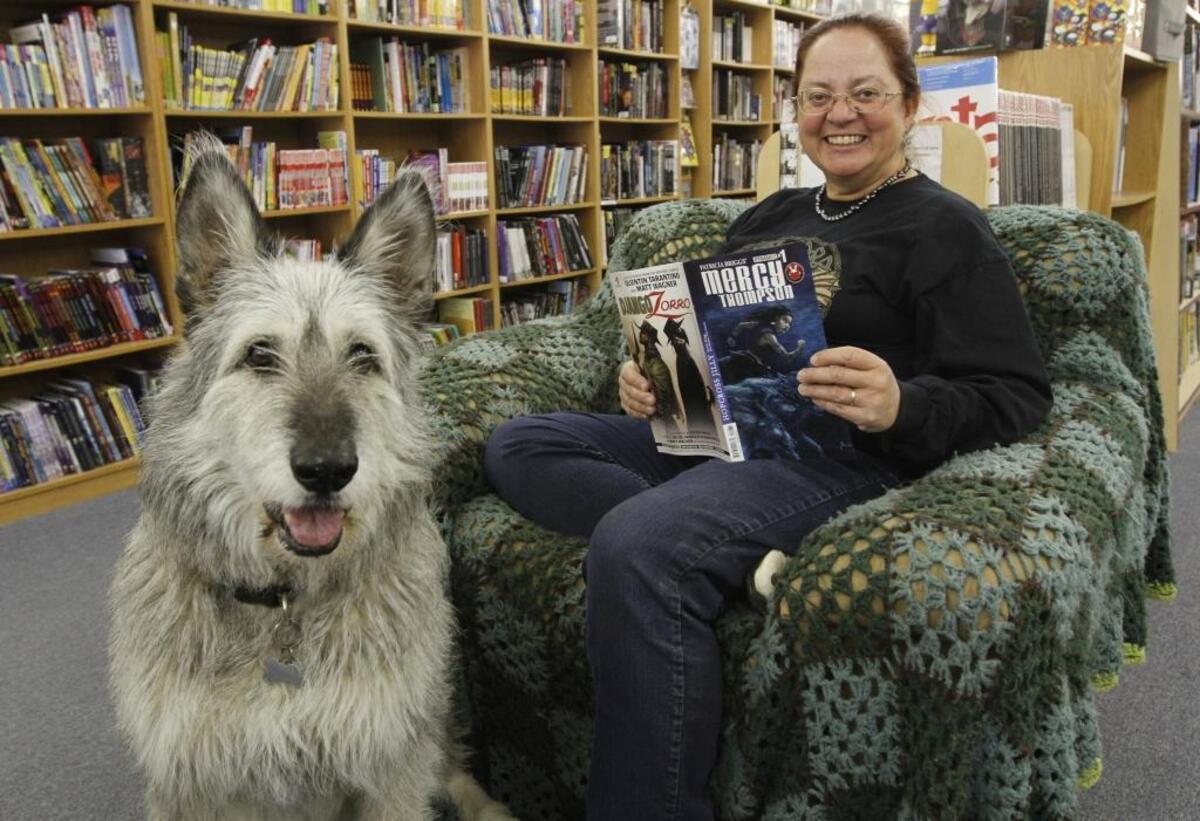 Charley poses with bestselling fantasy author Patricia Briggs at Adventures Underground in 2014. The famous pup was featured on a special variant cover of Briggs’ comic “Mercy Thompson: Hopcross Jilly.”