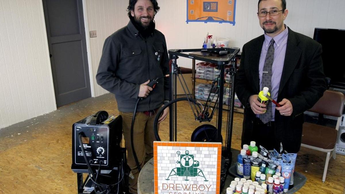 Nick Napoli, left, and Davin Diaz at the new DrewBoy Creative gallery in the Confluent maker space in Richland, which will feature the Red Show inaugural art exhibition.