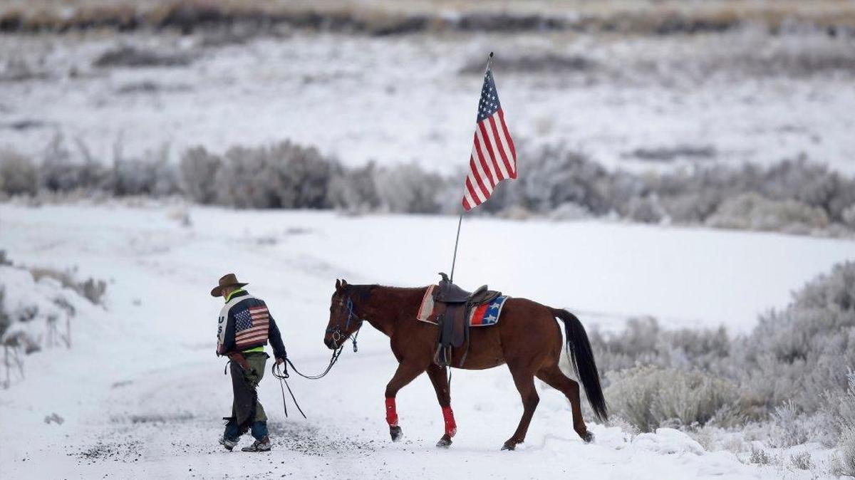 Cowboy Dwane Ehmer, of Irrigon, a supporter of the group that occupied the Malheur National Wildlife Refuge, walks his horse Jan. 7, 2016, near Burns, Ore. The group has said repeatedly that local people should control federal lands, but critics say the lands are already managed to help everyone from ranchers to recreationalists.