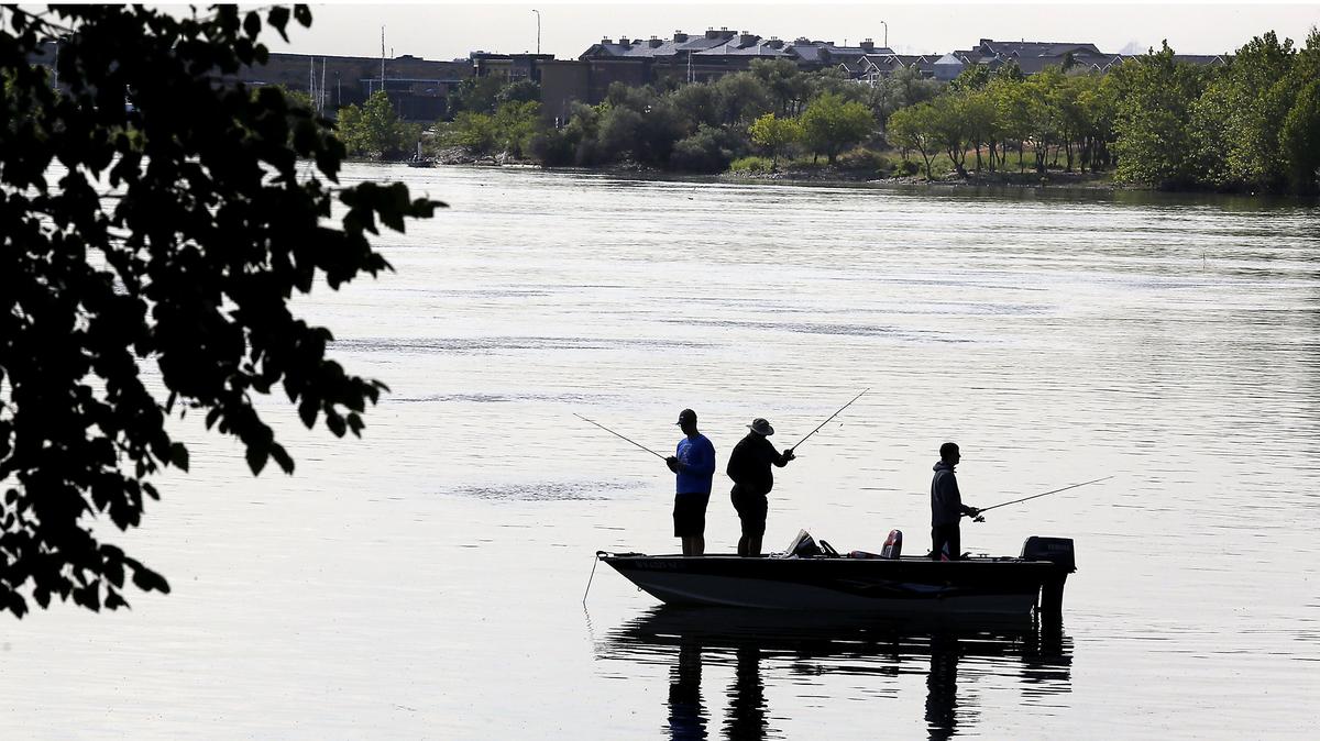 A trio of anglers fish Thursday morning from a boat along the Richland shoreline on the Columbia River. The day started overcast but quickly transitioned into bright and sunny skies throughout the Tri-Cities. The National Weather Service forecast abundant sunshine and hot temperatures throughout the weekend. See Weather, Page 8A.