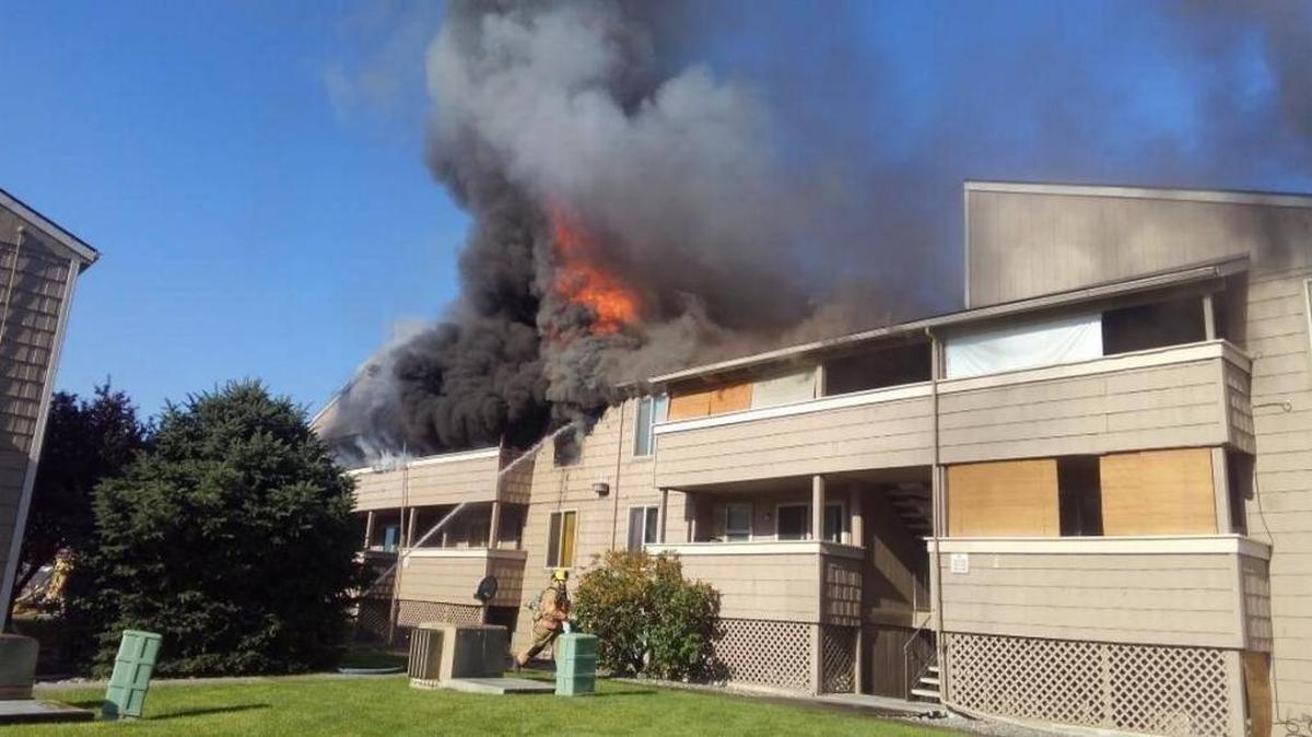 The “D” building at Tanglewood Apartments in Kennewick caught fire Saturday morning.