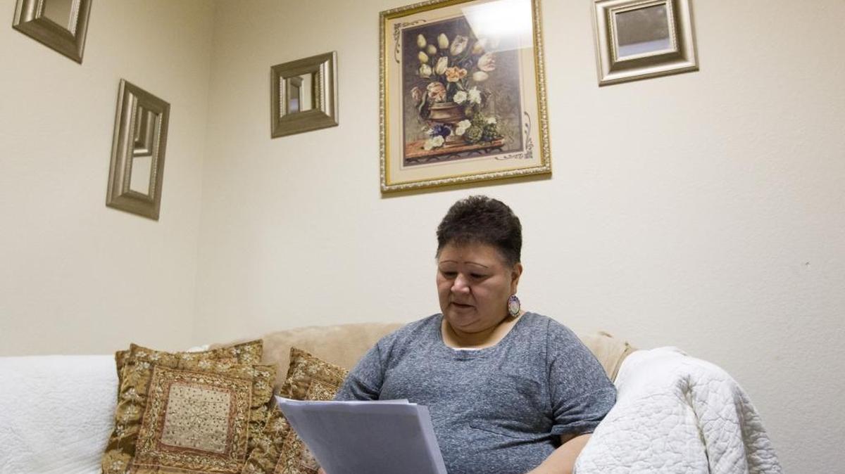 Shoshone-Bannock native Willeena George practices on Thursday, June 16, reading her story about her son, Dominque Nappo, who commited suicide in Fort Hall, Idaho, in April 2008, at Yakama Nation Behavioral Health in Toppenish, Wash. George, now the administrative assistant of Yakama Nation Behavioral Health program, has thrust herself into suicide awareness and prevention work to help others as well as herself.