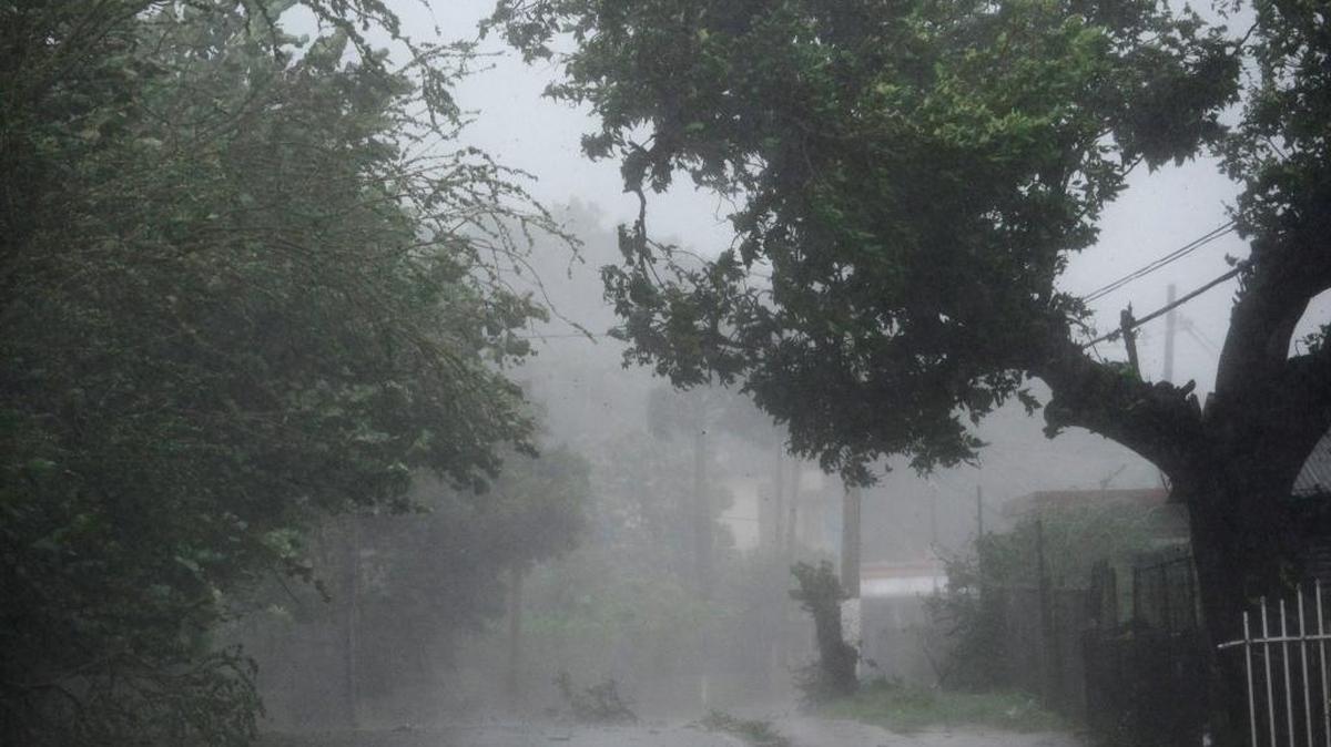 High winds and rain sweep through the streets of the Matelnillo community during the passage of hurricane Irma, in Fajardo, Puerto Rico, Sept. 6.