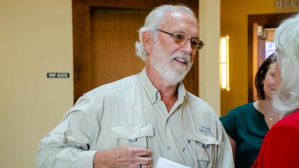 U.S. Rep. Dan Newhouse, R-Sunnyside, speaks with Richland Mayor Theresa Richardson following a Friday afternoon tax roundtable with Tri-City chamber leaders.