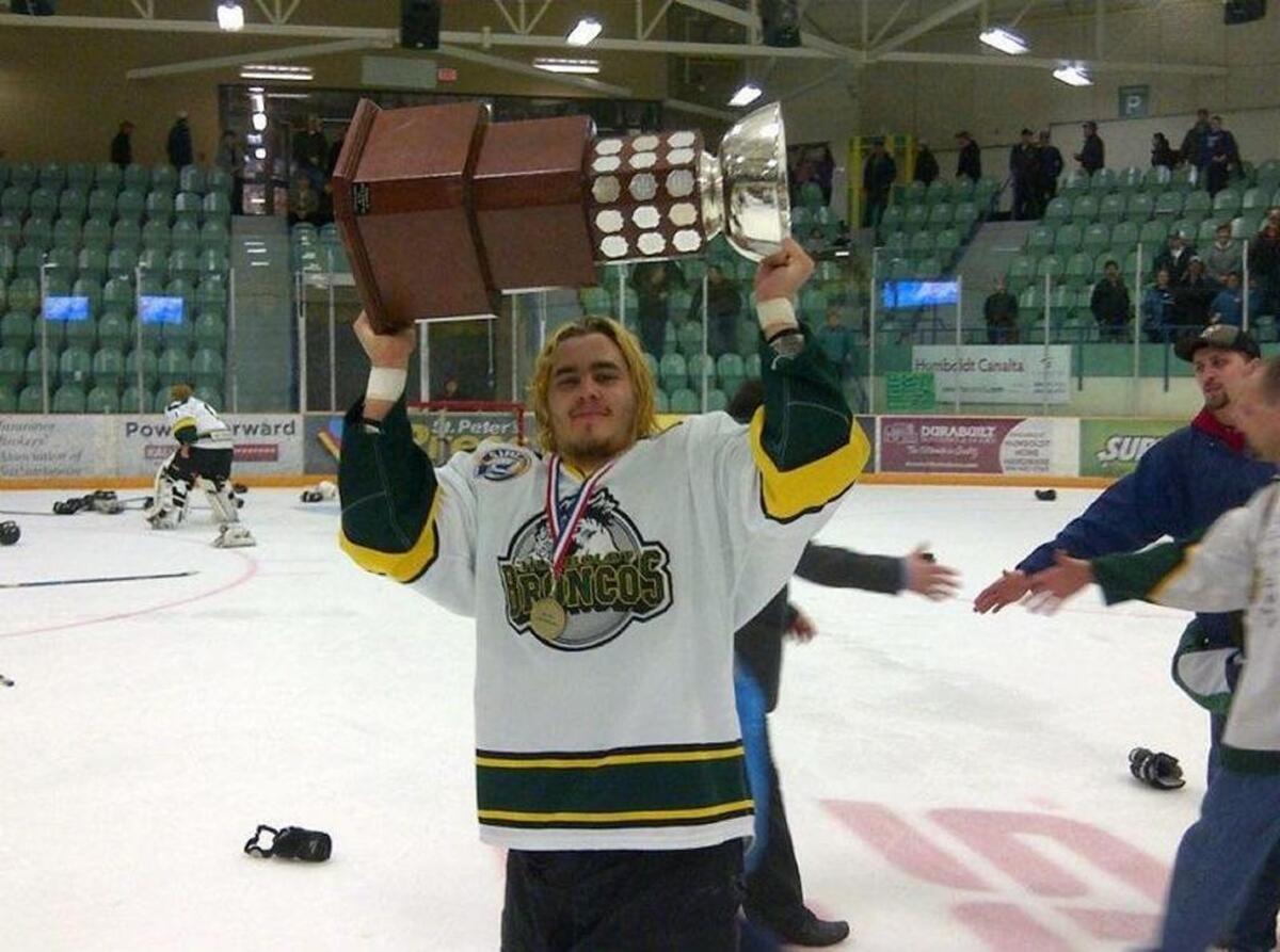 Kennewick native Chase Wharton raises the Anavet Cup after the Humbolt Broncos beat the Portage Terriors in 2012. Wharton played for the Broncos from 2010-12.