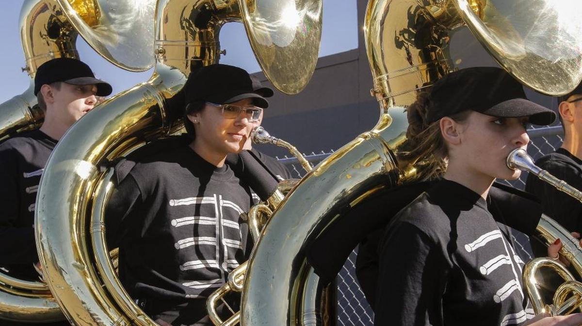 Chiawana High School’s marching band waits at the gate at Lampson Stadium to perform in the 36th annual Cavalcade of Bands on Saturday in Kennewick. Two dozen of the best marching bands in the Northwest took part in the day-long competition. It was the first competition of the season for most bands.