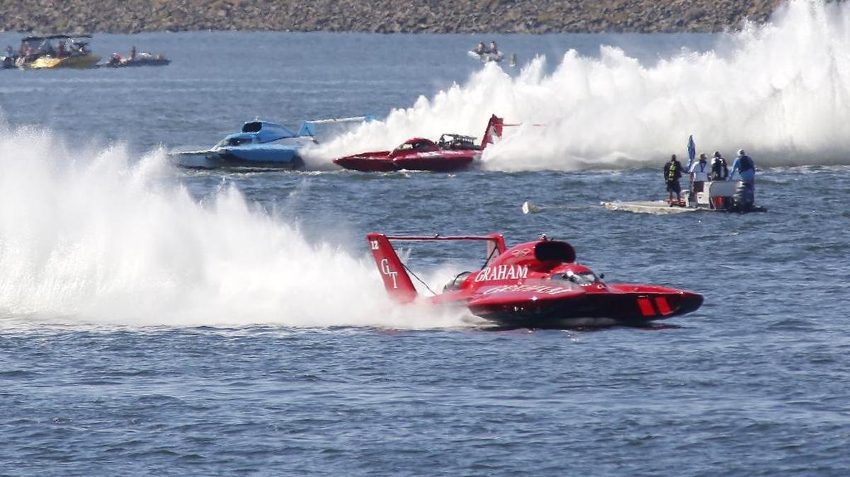 J. Michael Kelly in the U-12 Graham Trucking unlimited hydroplane races to a Columbia Cup championship Sunday. Jimmy King in The U-3 Grigg’s Presents the Miss Ace Hardware battles for second place against Jimmy Shane, left, in the U-1 HomeStreet Bank. See story on Page A11 and photos on A8. Check out videos and photo galleries at tricityherald.com
