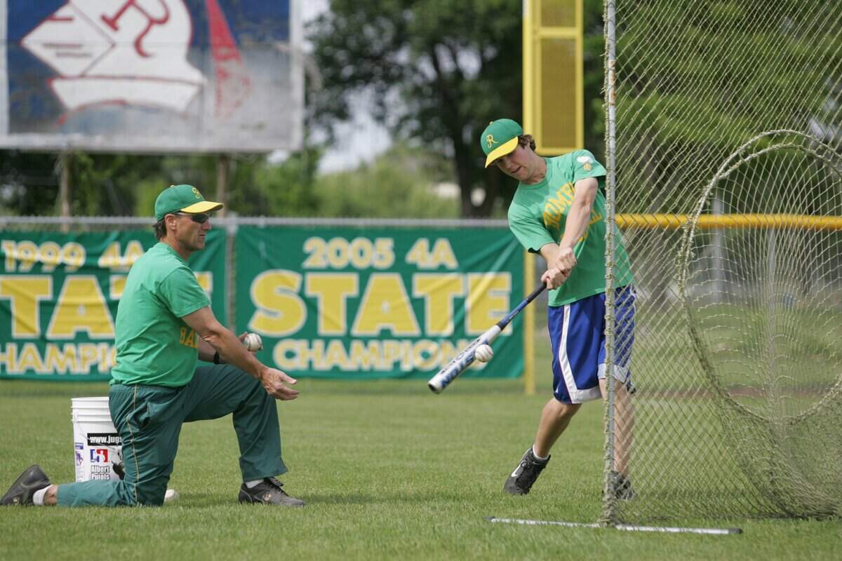 2007 File photo: A familiar scene in the Jacobs household – Richland baseball coach Ben Jacobs playing soft toss with his son, Brett.