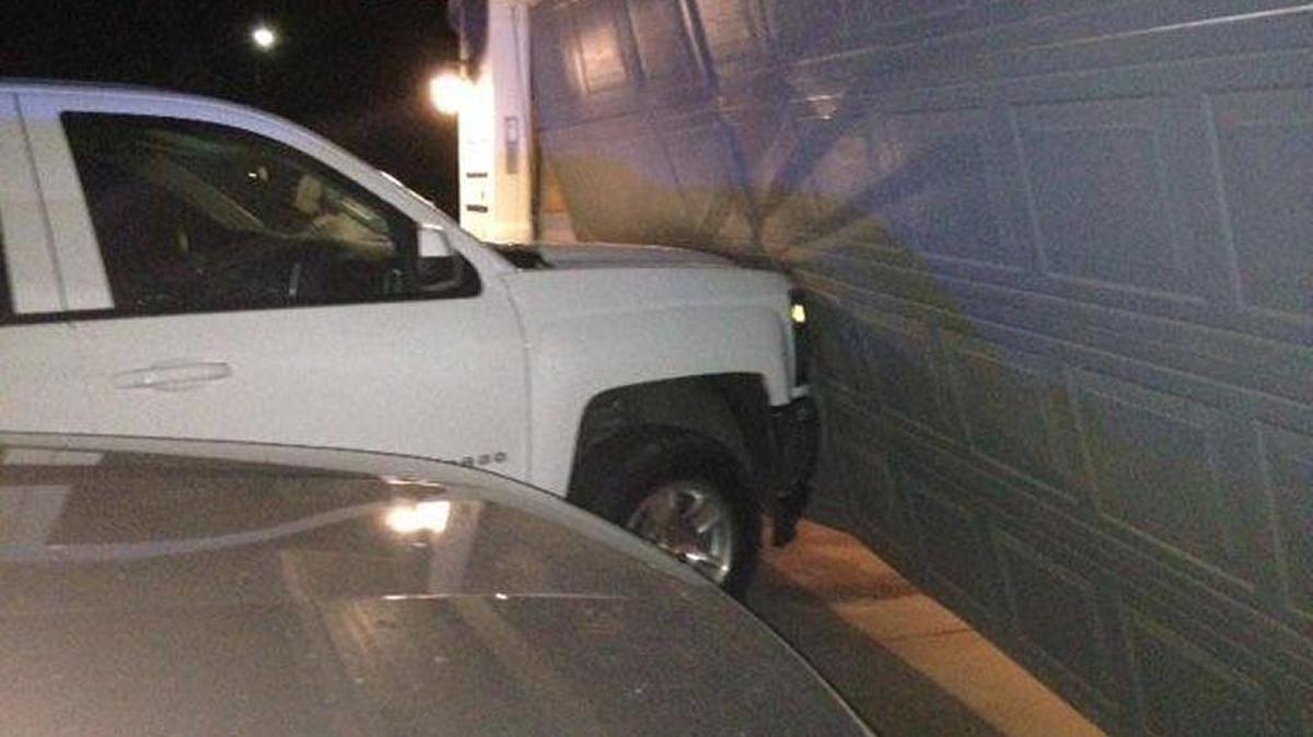 A pickup was knocked into a garage door in Kennewick in a hit and run collision, according to Kennewick police.