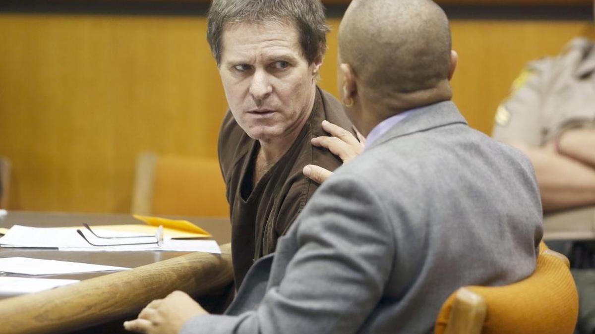 Richard E. Cain has been sentenced to life in prison with a minimum eight-year, two-month term for sexually assaulting a young girl. He’s pictured speaking to previous attorney, Christopher Swaby, during a 2014 hearing in Benton County Superior Court.