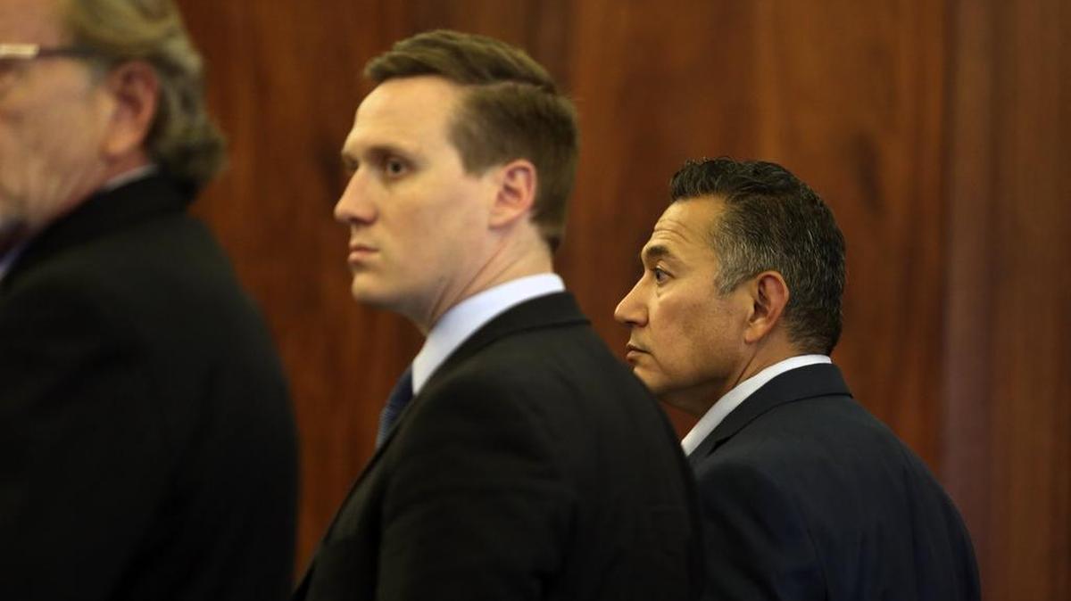 Richard J. Aguirre, 52, right, stands with his defense attorneys Friday during his trial in Franklin County Superior Court.