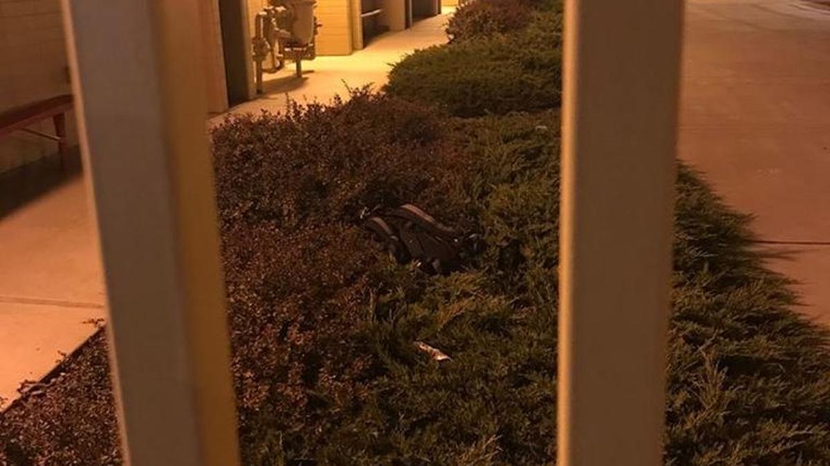 Police arrested two teens when a watchful neighbor spotted them testing doors to try and find an open one.
