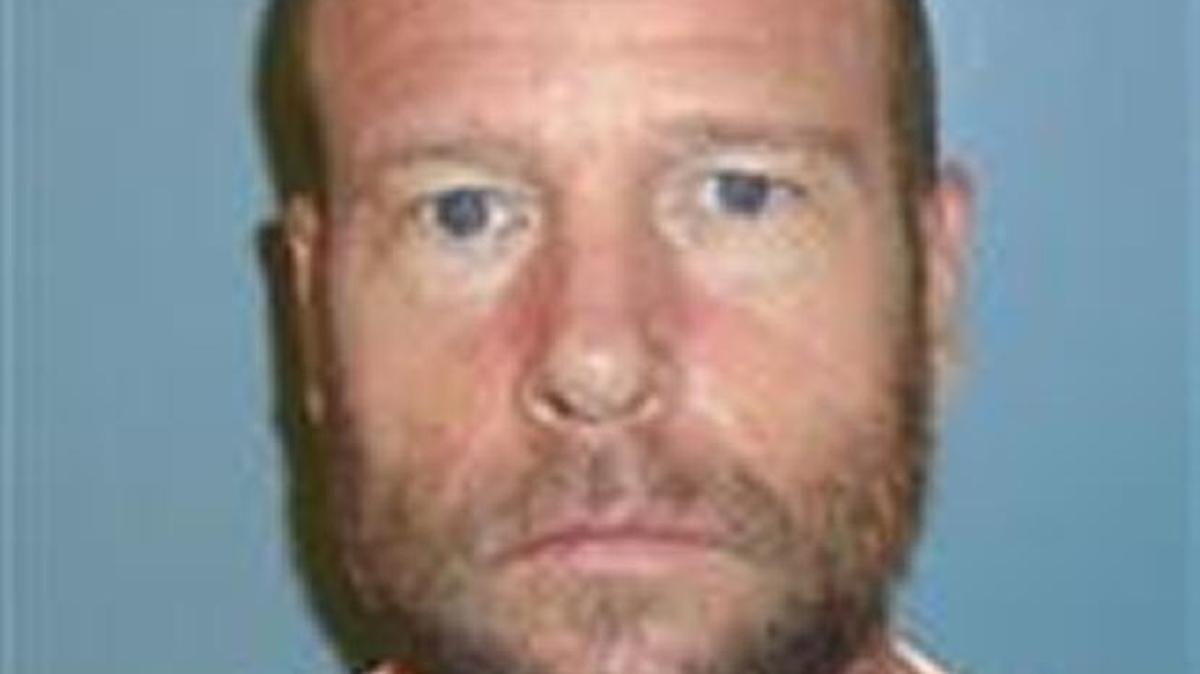Travis L. Thomas