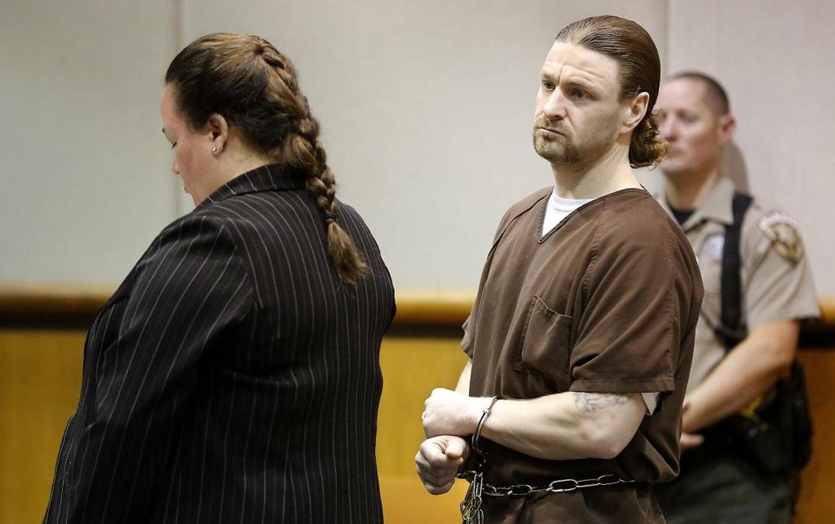 Brandon L. VanWinkle is pictured here during his 2016 sentencing hearing standing with his attorney Karla Kane.