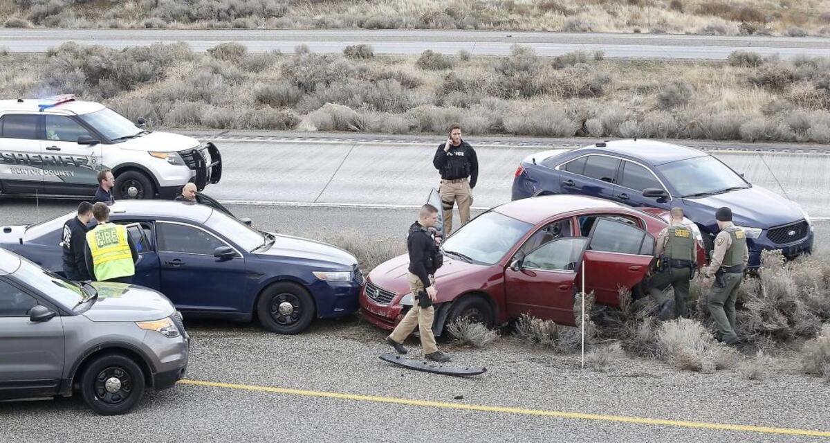 The Nissan Altima driven by suspect Richard Vasquez is pinned in by police cruisers after being spun out following a high-speed chase that started in Kennewick and ended on I-82 at the Dallas Road exit. Police officials says two civilian vehicles and two police vehicles were damaged during the incident. No serious injuries were reported. Watch a video at: tricityherald.com/video