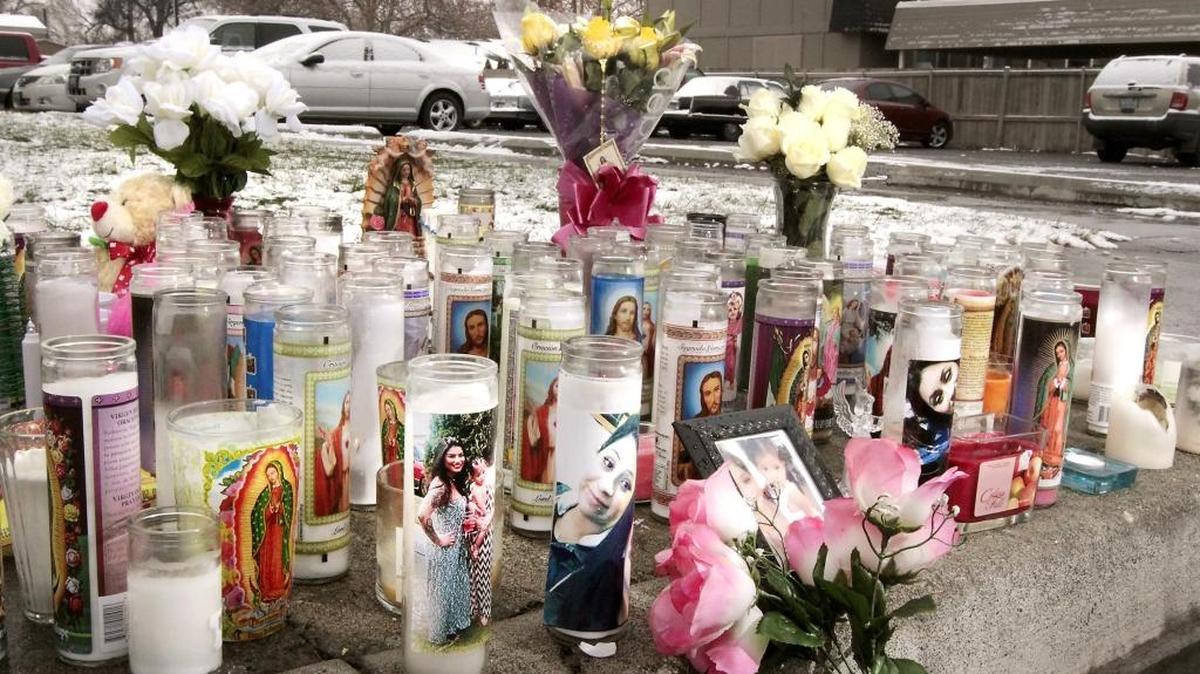 A memorial of candles, figurines, stuffed animals and flowers has been created for homicide victim Luisa Garcia, 21, at the site in the 600 block of North Tweedt Street in Kennewick where she was pushed from a car on Christmas Eve.