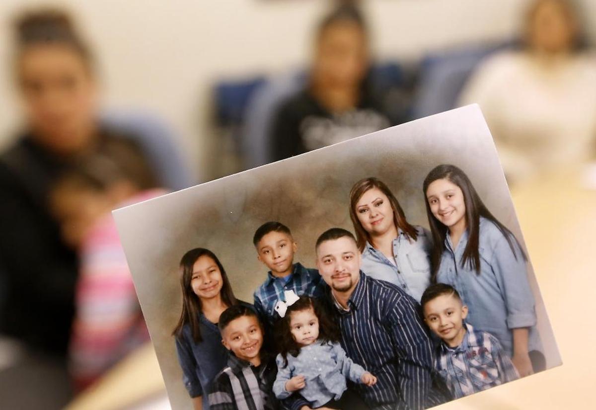 Edwin Espejo is shown with his wife, Maria Ordaz, and their six children in this family portrait taken in 2016.