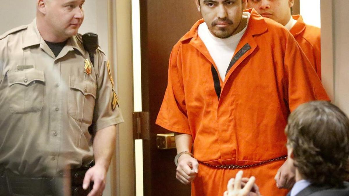 Santos Flores-Alcaide, left, and his nephew, Enrique Alcaide, enter a Franklin County Superior courtroom. The two are being tried together in the shooting death of Eduardo Angon Del Villar outside a Pasco dance club in August.
