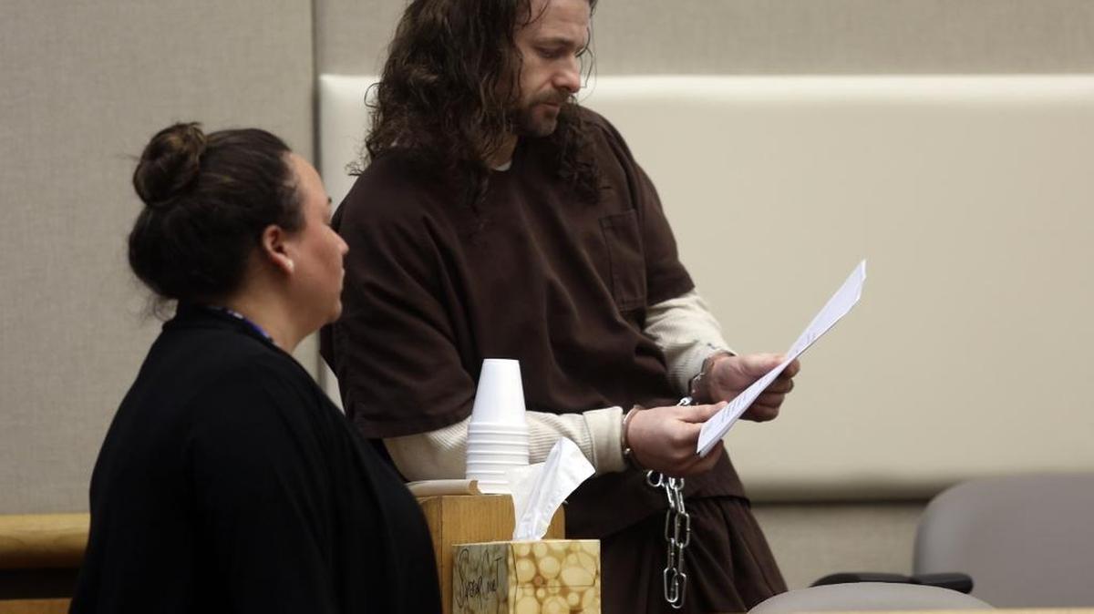 Brandon VanWinkle speaks with his attorney, Karla Kane Hudson, during a hearing Thursday in Benton County Superior Court.