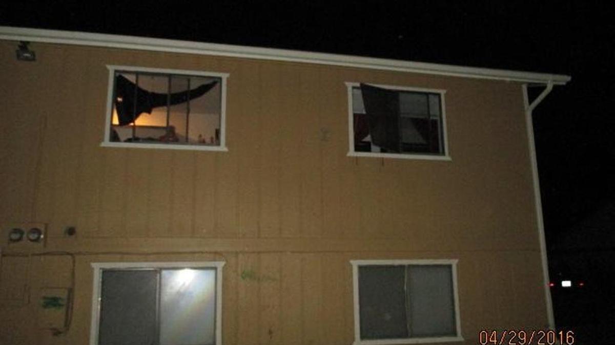 William J. Nash allegedly jumped from the window at top right in an attempt to flee Kennewick police early Friday morning.
