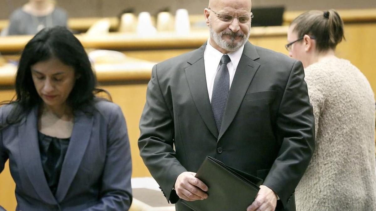 Dominick Furino, 57, leaves a Benton County Superior Courtroom Wednesday morning following a hearing for his case. Furino, a Hanford worker, is charged with felony harassment for allegedly threatening to kill people over denied medical claims. He allegedly claimed to have created a "hit list" over the denied claims and a judge previously ordered him to stay away from a number of job-related sites.