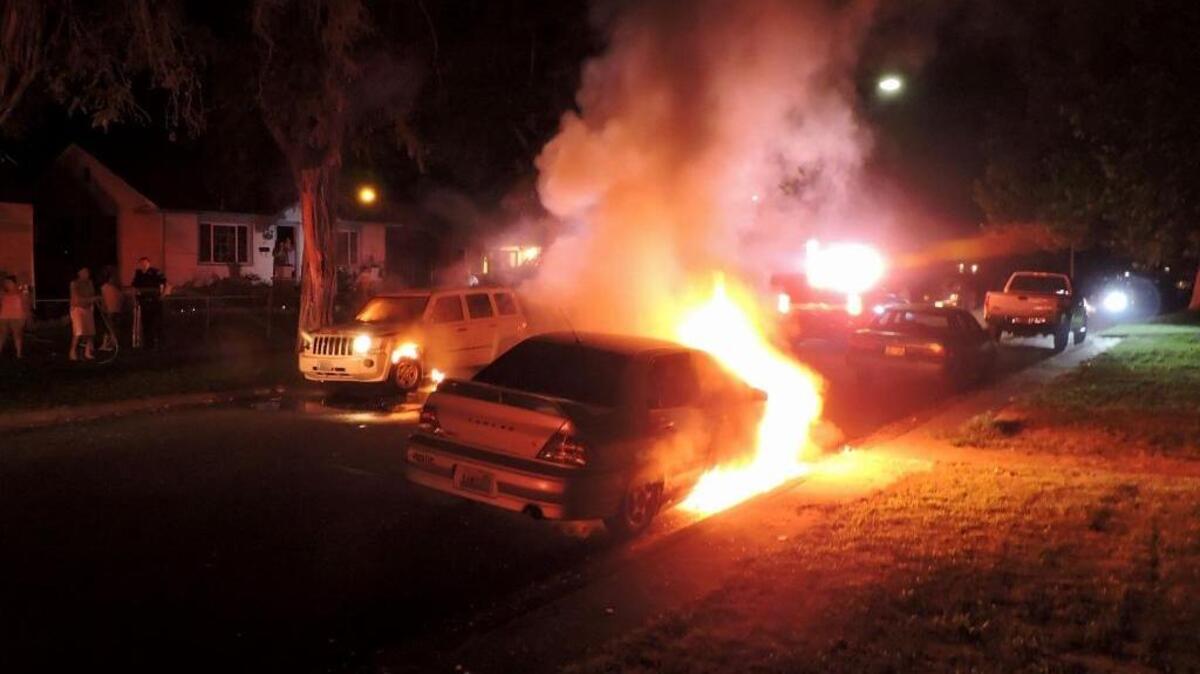 Someone set two vehicles on fire Saturday night on a nighttime Pasco street.