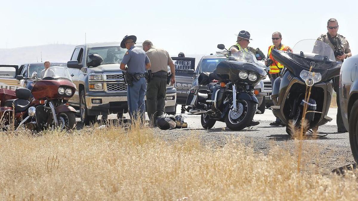 Franklin County Sheriff deputies and Washington State Patrol troopers investigate Friday’s scene on Highway 395 about three miles north of Pasco where a man was shot in the leg. Watch a video at tricityherald.com/video