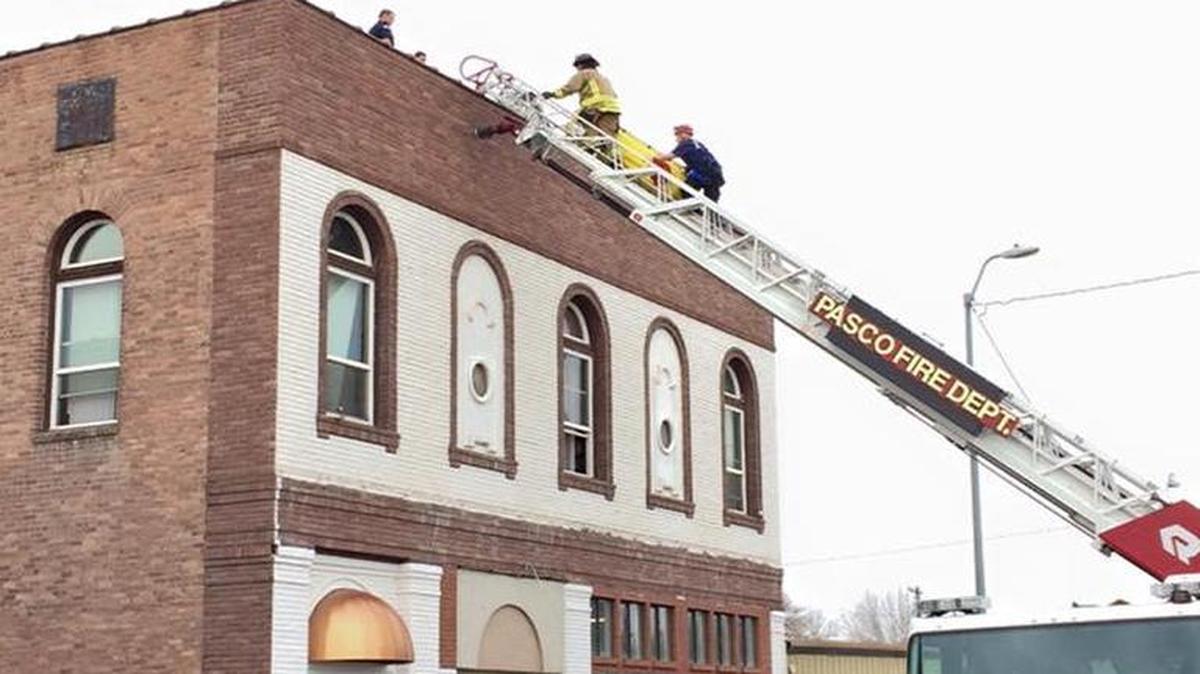 Pasco fire officials helped police remove a suspect from the roof of the Union Gospel Mission on Wednesday morning. He was reportedly threatening to shoot mission employees.