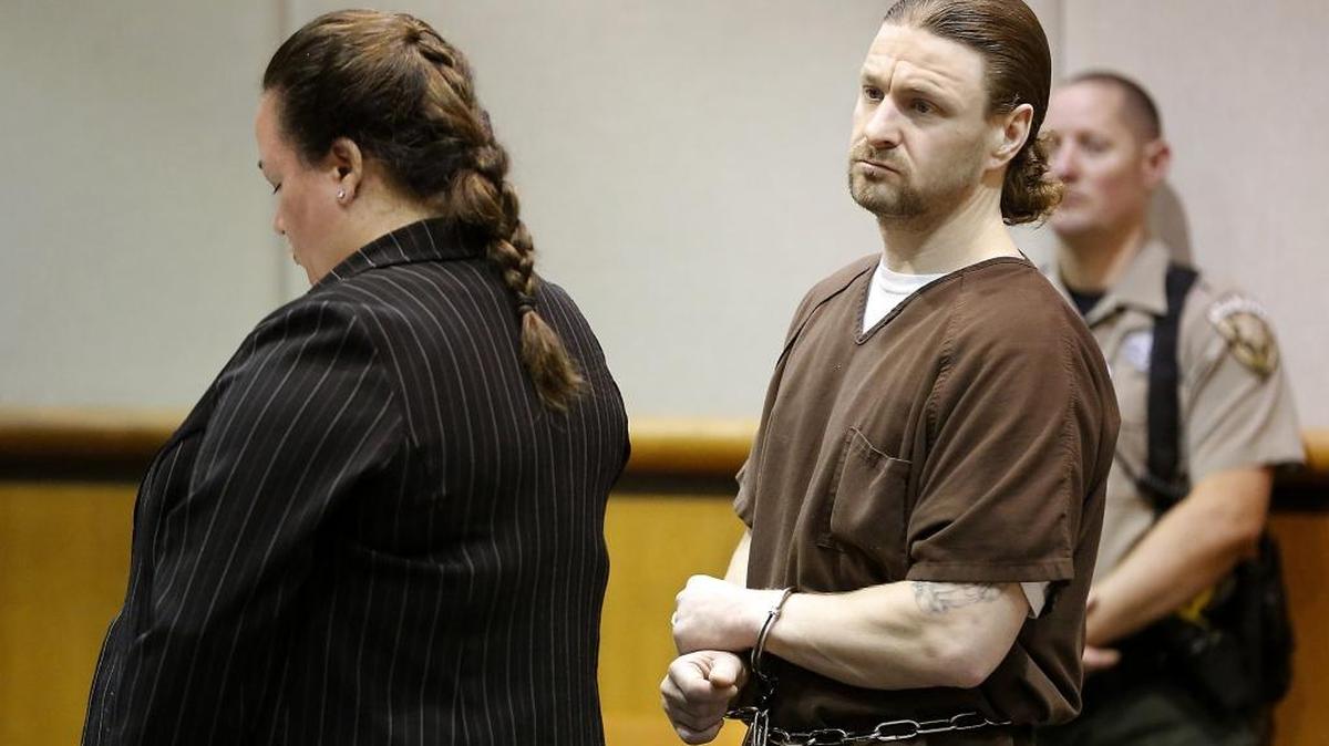 Brandon VanWinkle, recently convicted of courtroom assault, prepares Wednesday to ask Judge George Fearing for less prison time. VanWinkle’s defense attorney, Karla Kane Hudson, stands with him in Benton County Superior Court. Watch a video at: www.tricityherald.com.