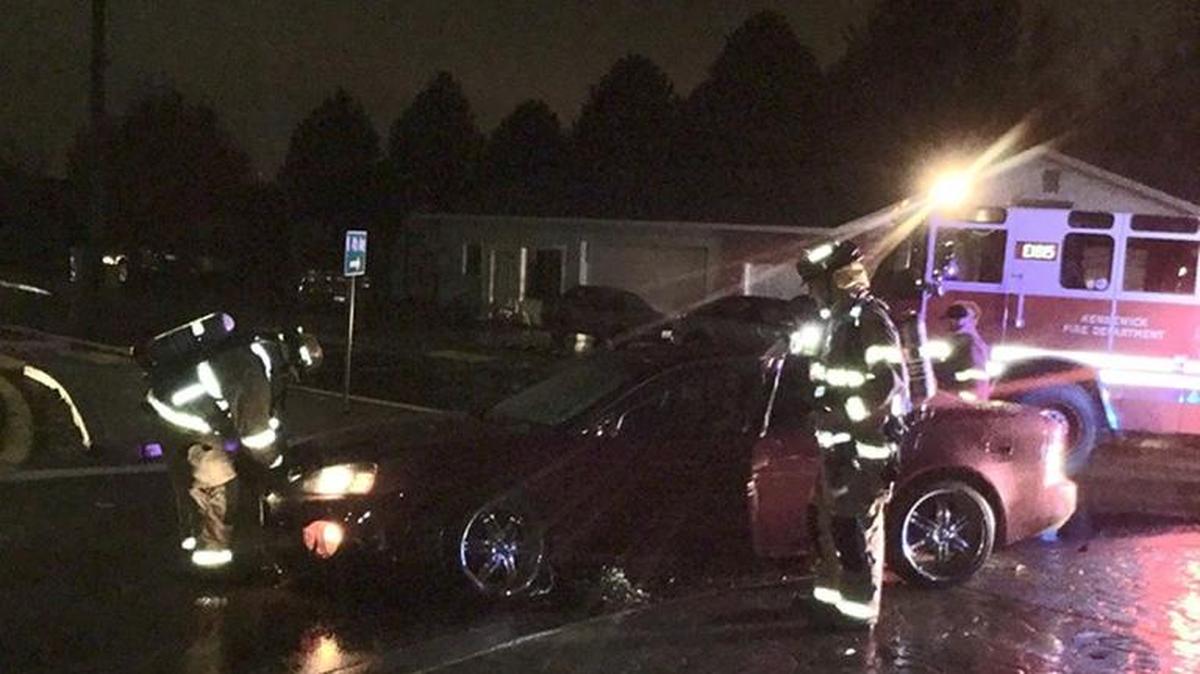 Kennewick police are looking for the men who were in this car after they crashed at the roundabout and grabbed the beer on Wednesday.