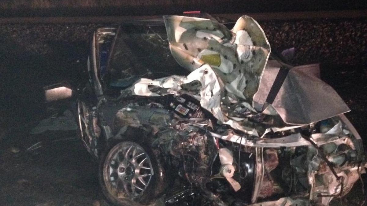 A Honda was hit by a train after it stalled Saturday night on train tracks in Finley.