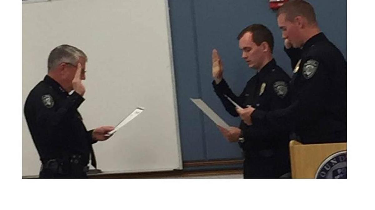 Kennewick Police Chief Ken Hohenberg swears in new officers Dennis Wise and Zach Moore on Oct. 3.