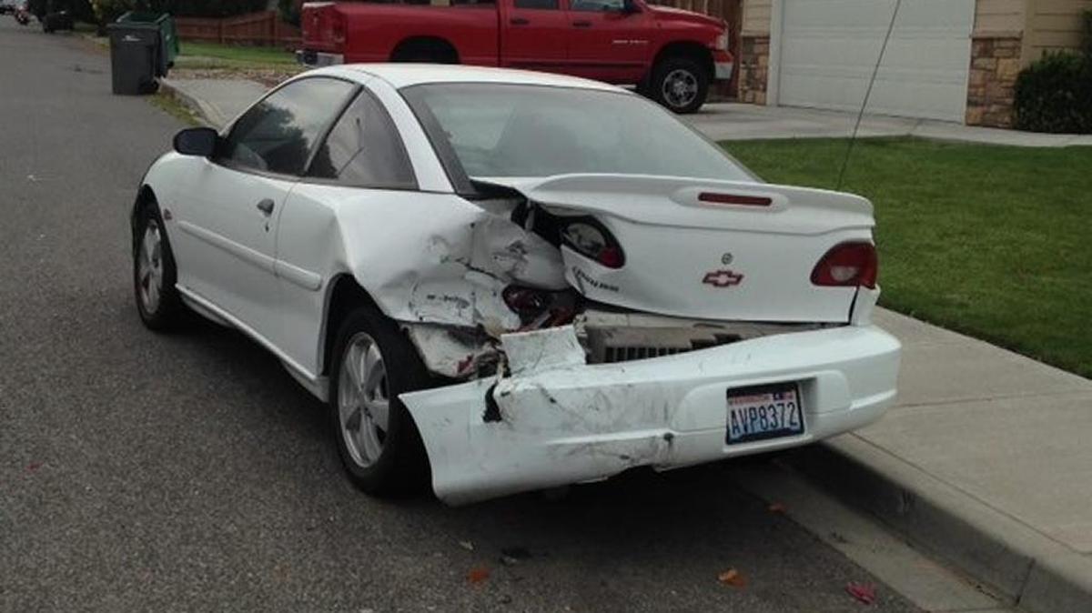 Kennewick woman was arrested after she reportedly crashed into a parked car and sped away Monday.