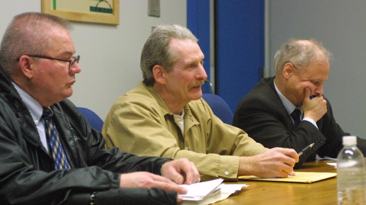 Jerry D. Lain, 59, appears to be a free man nearly 35 years after he violently attacked Richland police Officer Mike Fitzpatrick in Columbia Park near the Richland Y. Lain’s release was blocked previously by two Washington state governors, but online offender custody records show he was out of custody as of Monday. Lain is pictured in 2011with counselor, William Thacker, left, and Bellevue attorney Richard Linn, right, as he addressed three members of the state Indeterminate Sentence Review Board while in the Monroe Correctional Complex.