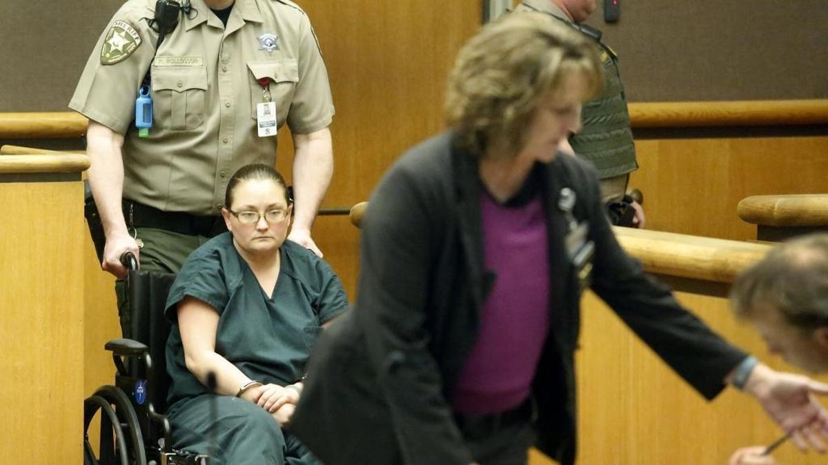 Amy S. Brown, 36, of Prosser is wheeled into her first appearance Monday in Benton County Superior Court on suspicion of second-degree murder of Amanda Hill. The fatal shooting happened early Saturday morning during a dispute at a birthday party in Prosser. Brown is apparently in a wheelchair because of an ankle injury unrelated to the alleged crime.