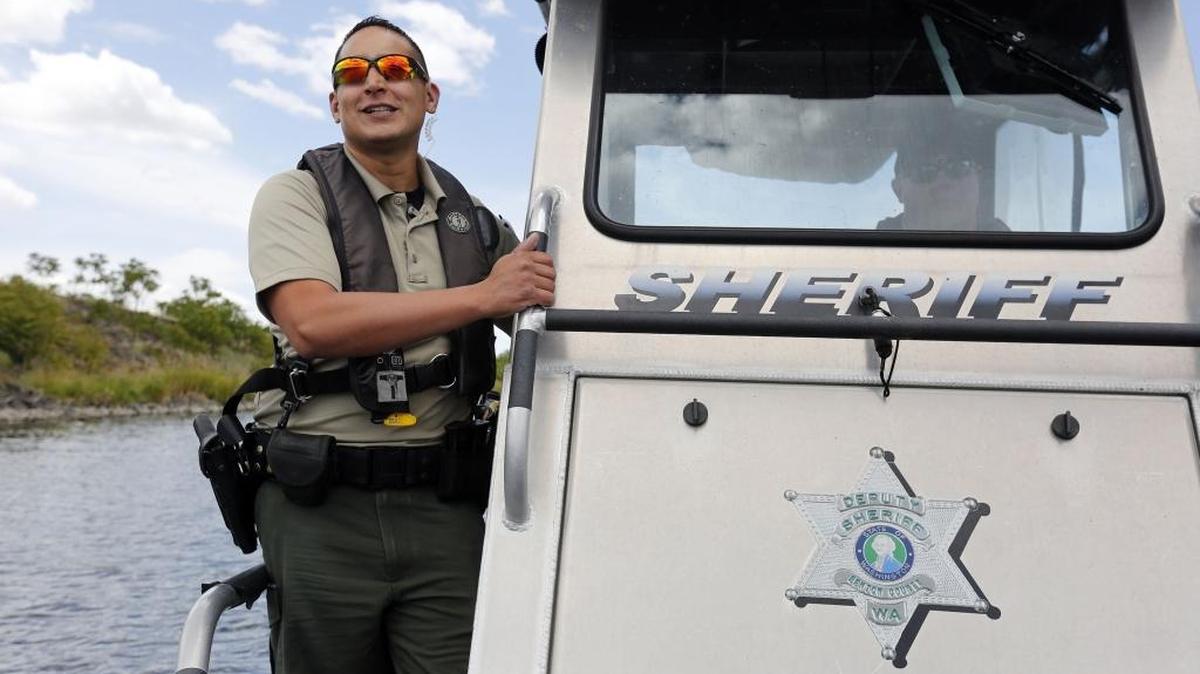 Benton County Sheriff's Office Deputies J.P. Benitez, left, and Brett Hansen patrol from the SAFE boat during a Operation Dry Water patrol on the Columbia River in Kennewick in 2016.