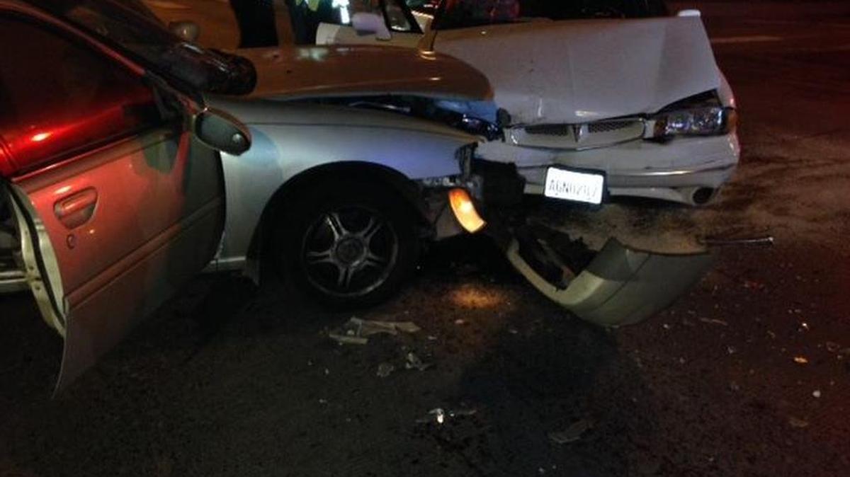 Four people were injured Friday night when the driver of a Pontiac Bonneville pulled in front of a Nissan Altima on Highway 395 at Yelm Street in Kennewick. The crash led to significant delays for southbound traffic on the highway.