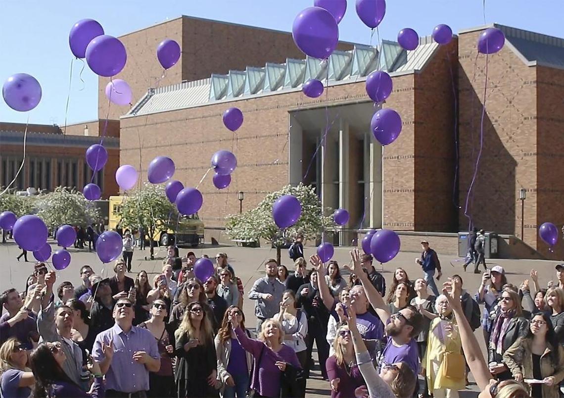 Friends and family members of Katy Straalsund celebrate the UW student’s life during her vigil in the University's Red Square in March 2016.