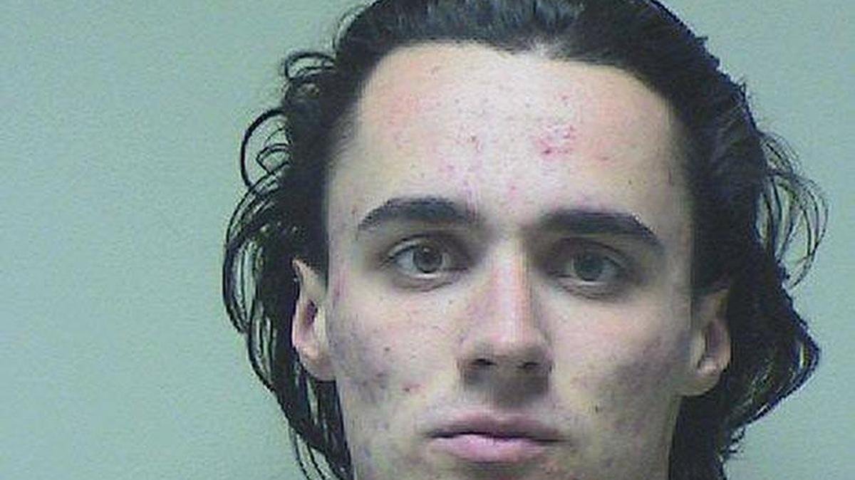 Kennewick police are searching for Dylan Ray Amos in connection to a vehicle theft where a man was dragged for several hundred feet as he attempted to stop two thieves from stealing his car.