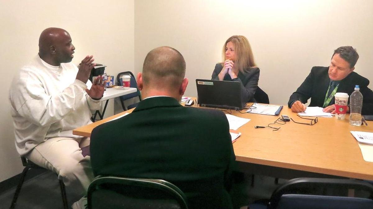 Brian Skinner talks to Kecia Rongen and Jeff Patnode of the Indeterminate Sentence Review Board during his parole hearing Thursday. Skinner was convicted of the 1979 murder of Vicki Bridges.