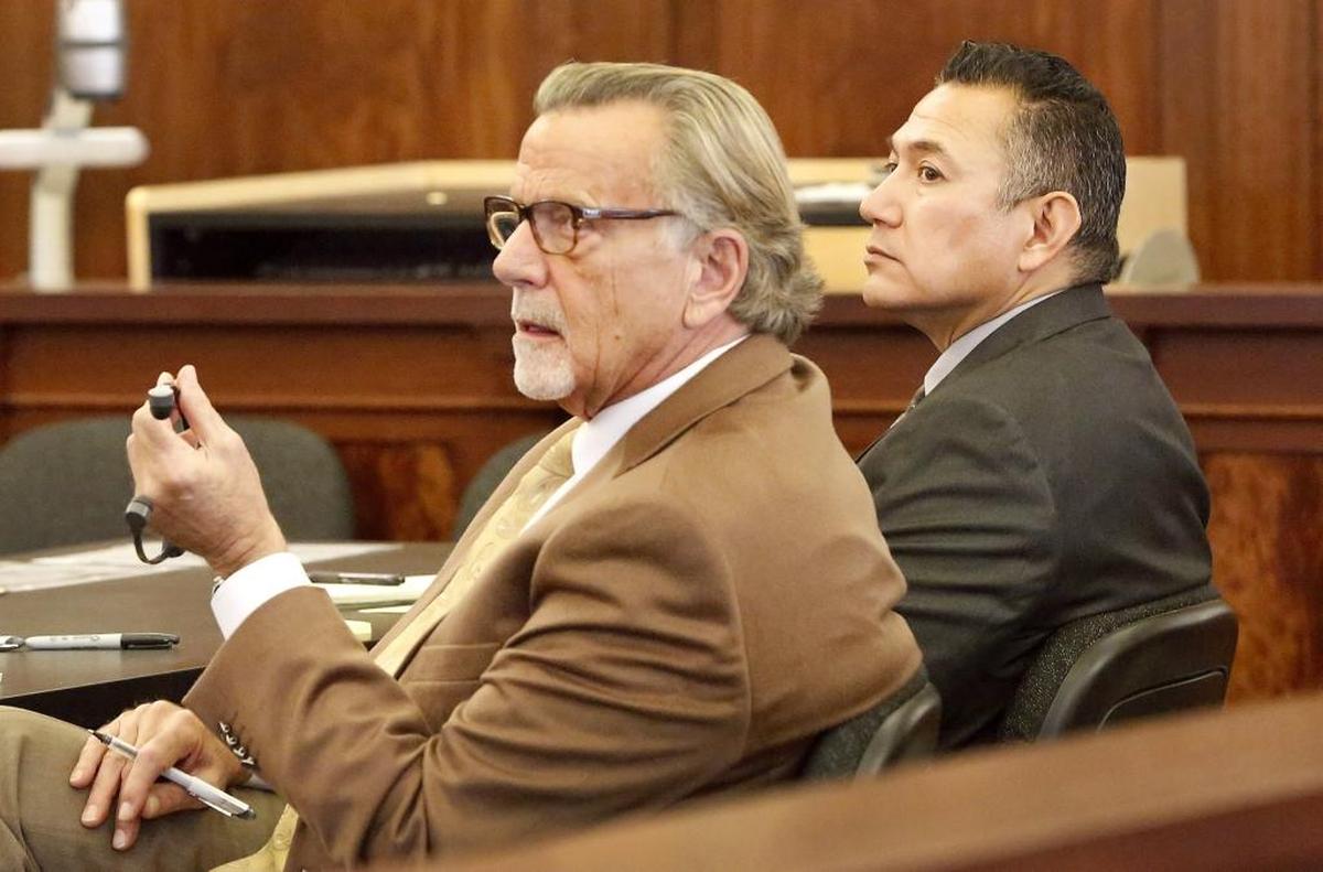 Murder charges were initially dropped in in 2017 in Spokane County against Richard J. Aguirre, right, a former Pasco police officer. He was accused of strangling a Spokane prostitute in 1986. John Henry Browne, center, has been Aguirre’s attorney.