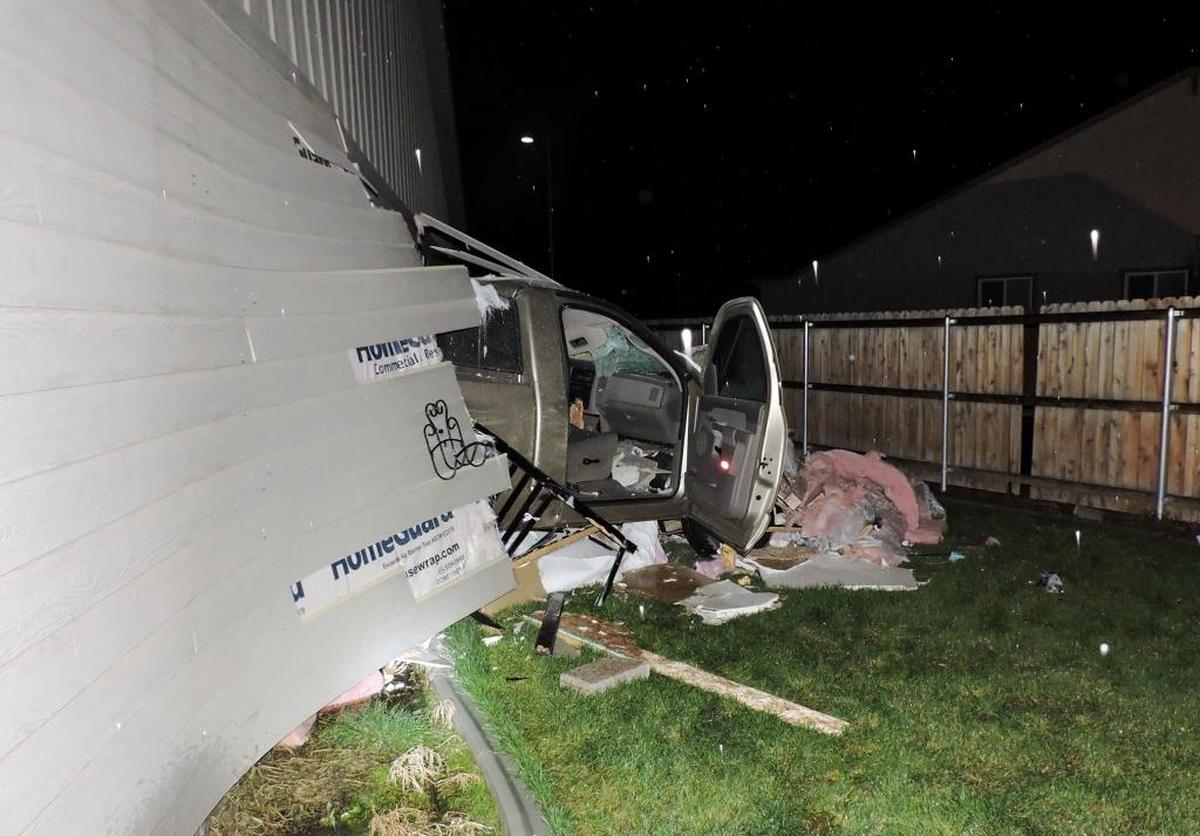 A Pasco man died after his truck went off the road and through a home near Convention Drive and Sandifur Parkway.