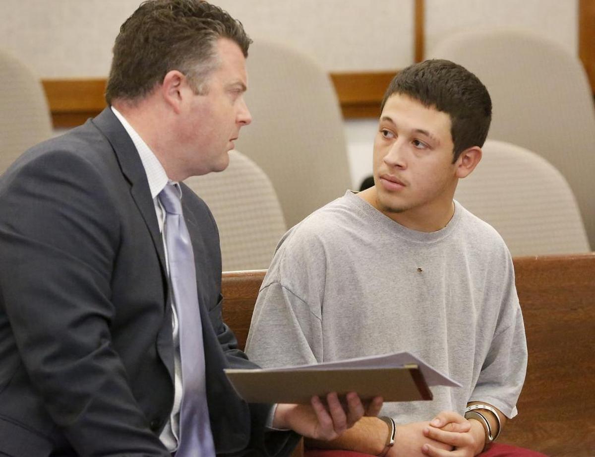 Jaden F. Quintero, 19, and his lawyer Scott Johnson in court in 2017 when he faced a murder charge. His brother went to prison for the crime.