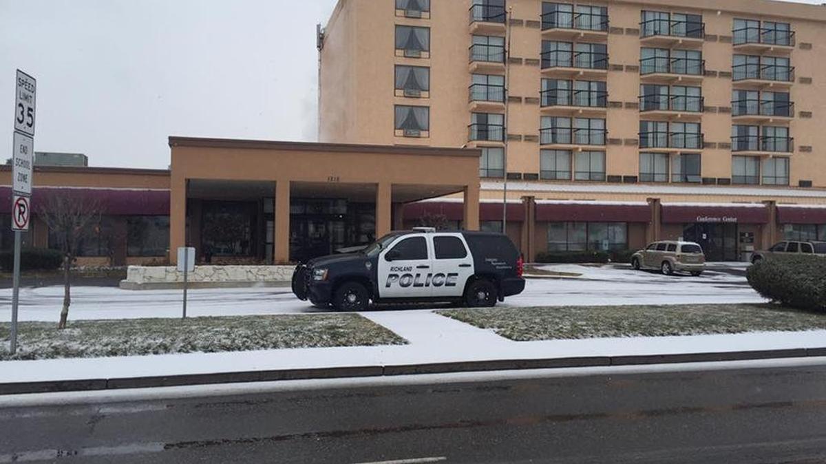 Richland police broke up an alleged heroin den Sunday morning after an M Hotel & Conference Center guest reported suspicious activity in a room. One person reportedly was arrested.