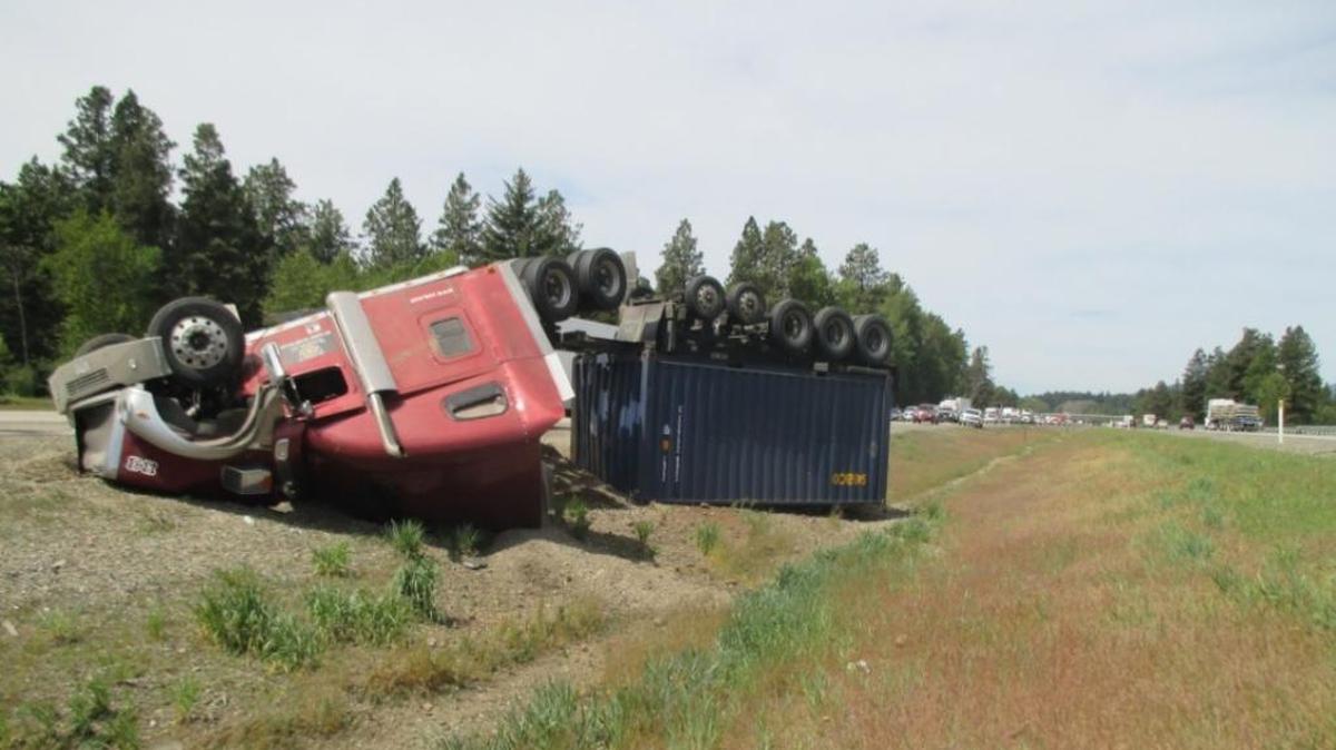 A Kennewick man was injured when the semi he was driving flipped the median of Interstate 90 Monday morning.