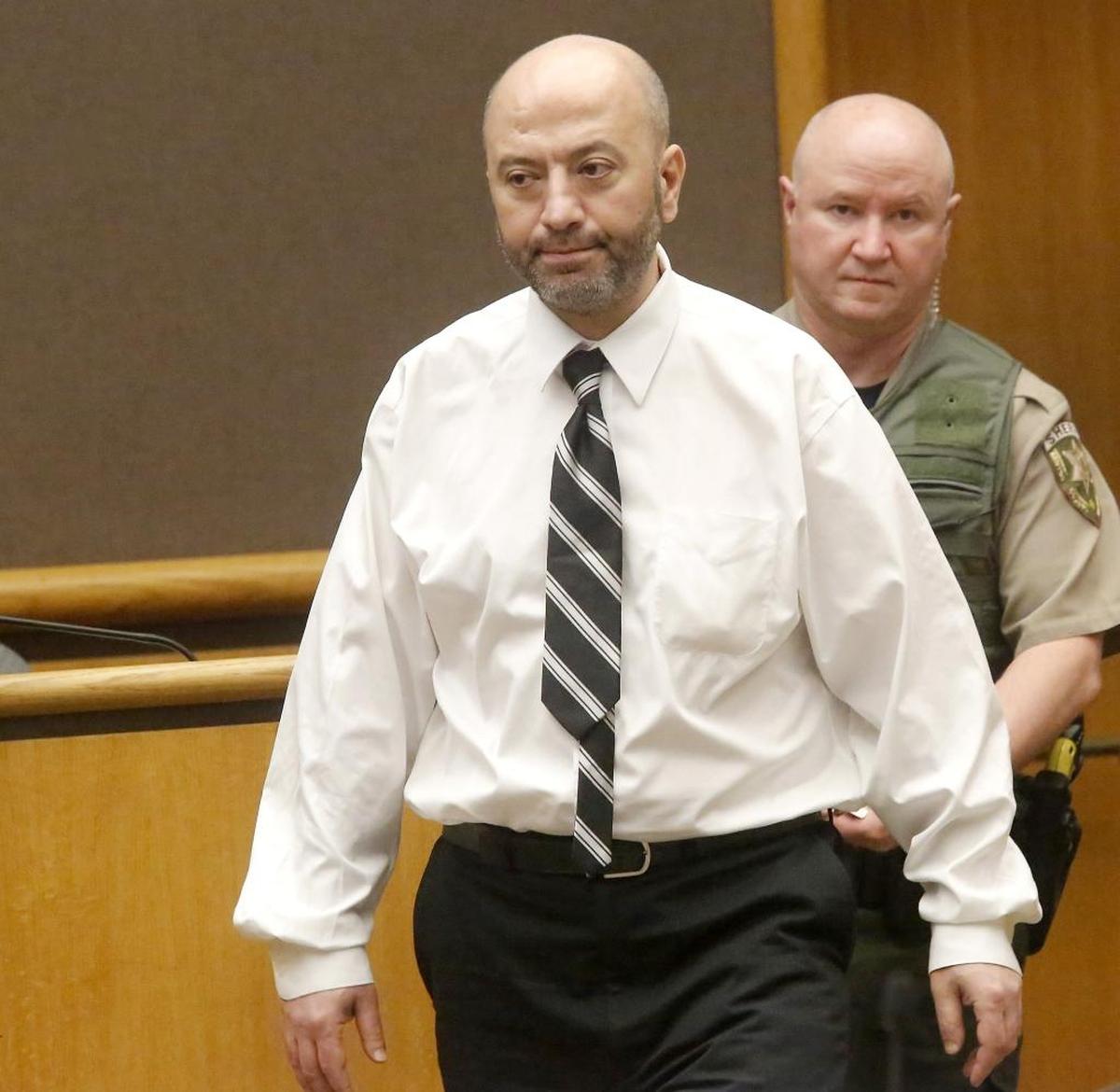 Abdul Rahman Sweidan is escorted into Benton County Superior Court in Kennewick Wednesday for his criminal jury trial. Watch a video: tricityherald.com/video